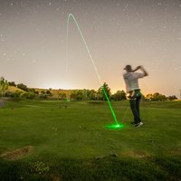 Long exposure of illuminated golf ball