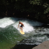 Dude surfing in a river in Germany.  It was too cool.