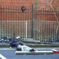 drug dealer who was running away was decapitated by a wrought iron fence.