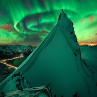 Northern Lights above Austnesfjorden summit in northen Norway