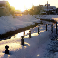 Nagaoka in snow, but fine day -Jan. 9, 2006 "Sunset of a river"