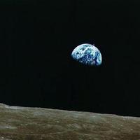 Earth over Moon plus a UFO...