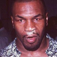 mike tyson after enjoying powdered donuts at a house party, in 1989