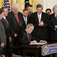 Bush signs away democracy...