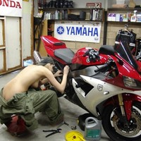 I sure would prefer servicing my bike on her garage!