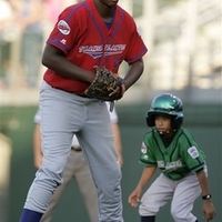 picture of that Gi-Normous 6' 8'' - 256 lb. 13 year-old playing little league
