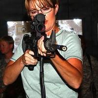 Sarah Palin with an M4. 