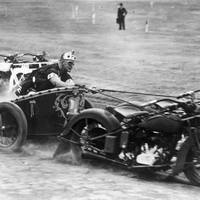 Australian police officers racing motorcycle chariots in 1936.
