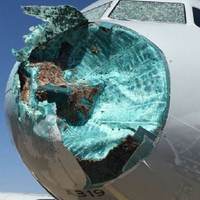 Hail destroys front of American Airlines plane