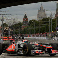 Jenson Button (McLaren) drives in front of the Kremlin