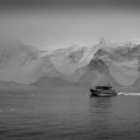 Cruising into the fog. by Andrew Swenda