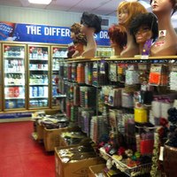 a wig store, salon, liquor store, and Chinese reataraunt, all in one
