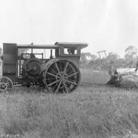 early gasoline tractor at work