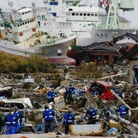 Searching for the victims of the tsunami in Miyako on March 14, 2011