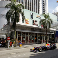 Red Bull Racing F1 car cruises downtown Kuala Lumpur