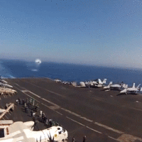 FA 18 breaks sound barrier as it passes carrier