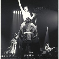 Freddie Mercury on Darth Vader's shoulders