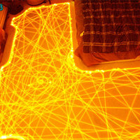 Long-Exposure Shot of a Roomba's Path Shows Beautifully Organized Chaos