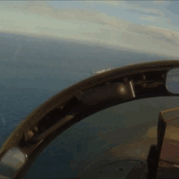 Chase plane's view of a Tomahawk missile hitting a ship