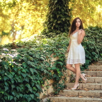 Lady walking on stairs by Nir Roitman