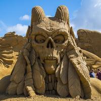 evil sand sculpture