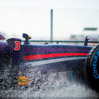 Red Bull F1 through a wet patch ..