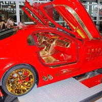 Red and gold Mercedes SLR - money can’t buy taste  