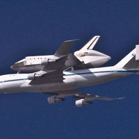 Space Shuttle hitching its last ride