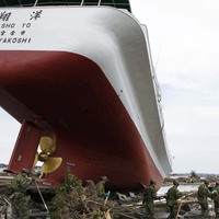 Search for victims around a ship swept out by the tsunami in Higashimatsushima