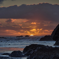 Setting Sun - Bandon, Oregon by Frank Ginn