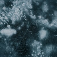 Abstract pattern of ice with bubbles by Lianhao Qu