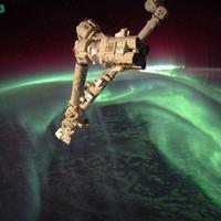 robot arms of the Space Station and  Aurora Australis 