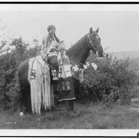 Cayuse indian woman on Horseback